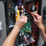 a technician doing HVAC check up